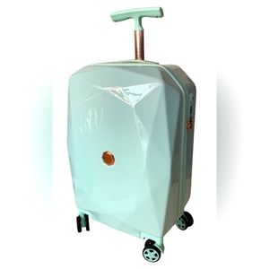 Kensie 21"spinner rolling carry-on.  Mint color NEW